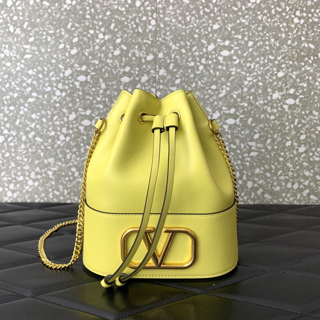 Valentino Garavani VLogo Signature Mini Bucket Bag in Yellow Nappa Leather